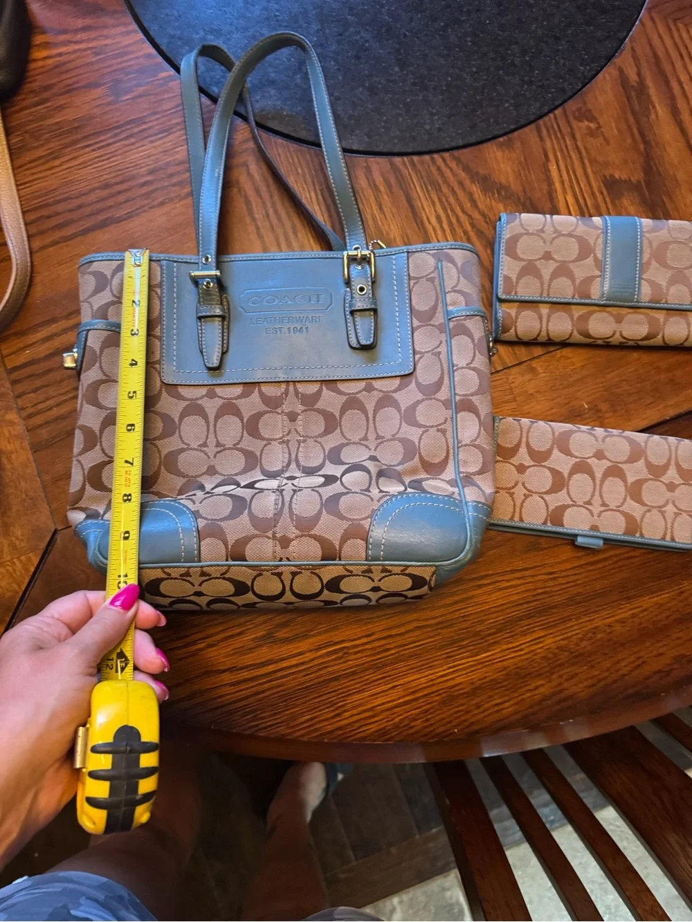 Coach Khaki Signature Canvas Tote with Blue Trim with check book and wallet.